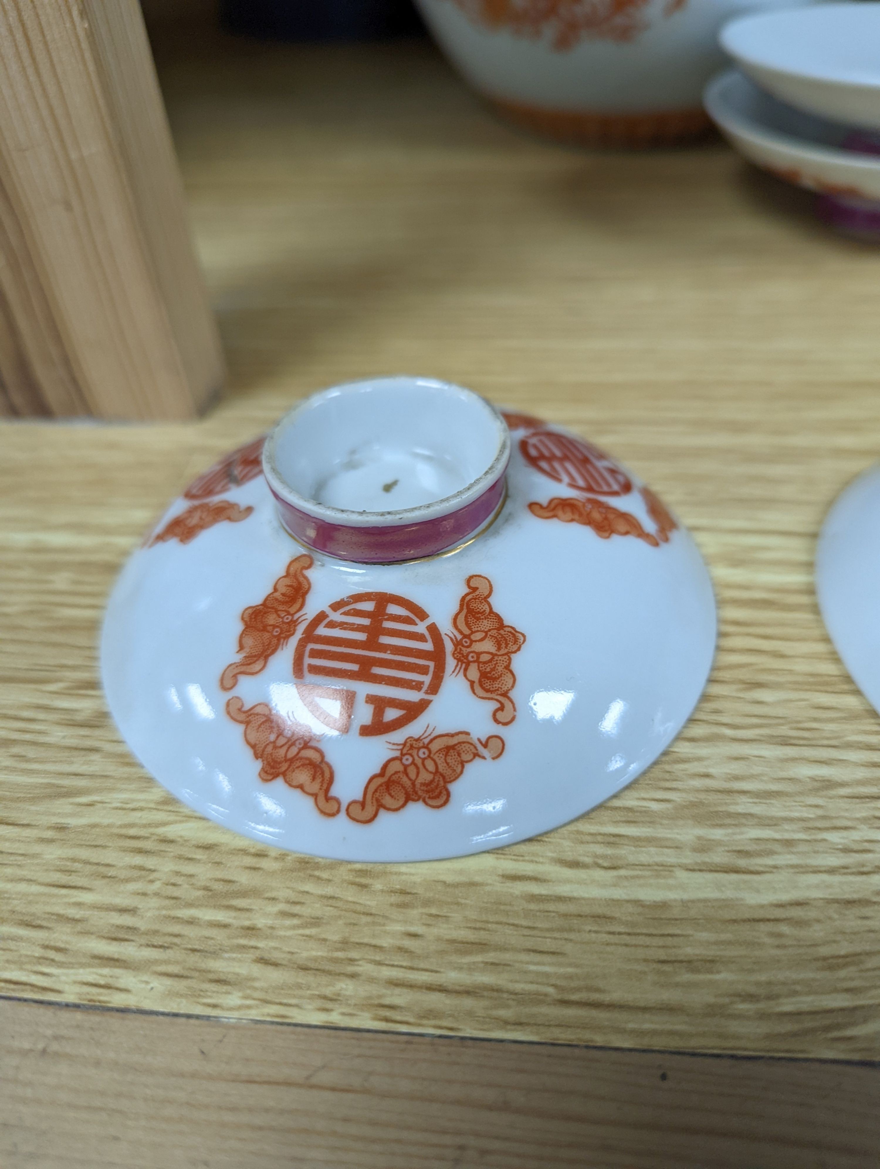 A set of five Chinese teabowls, covers and stands and a similar 'dragon' vase, 23cm